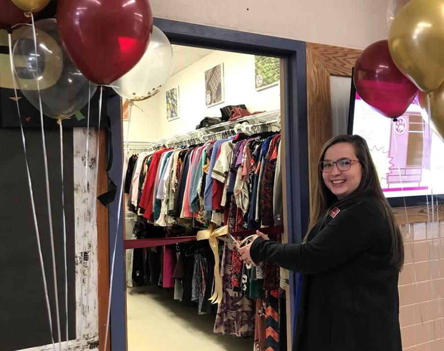 Elizabeth Lawton cuts the ribbon on the new Lynx Closet.